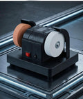 Badass Compact Table Grinder Featuring Dual Polish Discs For Quick Blade Sharpening Rust Stripping And Smooth Benchtop Finishing on a workbench.