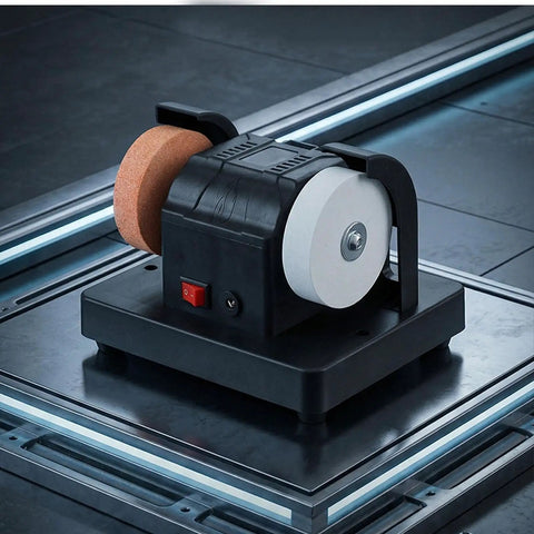 Badass Compact Table Grinder Featuring Dual Polish Discs For Quick Blade Sharpening Rust Stripping And Smooth Benchtop Finishing on a workbench.