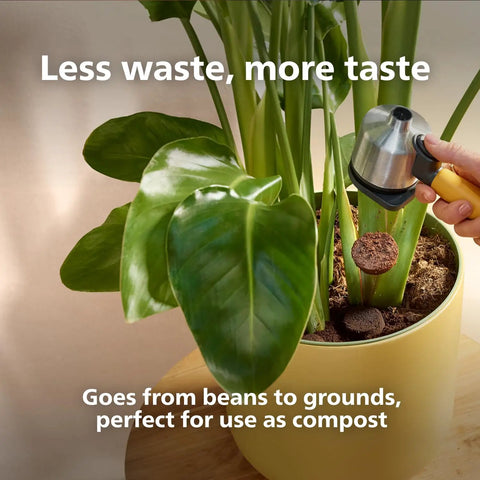 Person using a coffee grounds dispenser to apply coffee grounds to a plant in a yellow pot, highlighting compost use.