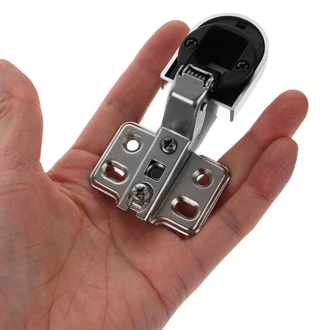 Hand holding heavy duty glass door cabinet hinges 26mm 2 pack soft close cupboard replacement hinges for display cabinets.