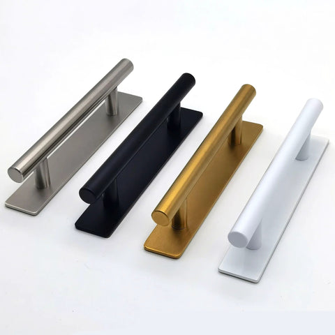 Four stainless steel and colored adhesive door handles in black, silver, gold, and white side by side on a white background.