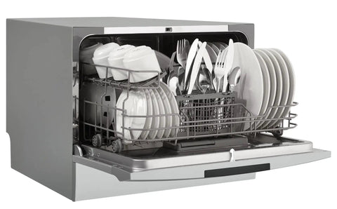 Total Game Changer Compact Countertop Dishwasher In Brushed Stainless Steel full of clean dishes, six place settings visible.