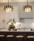 Get The Low On This Badass Matte Black 4 Light Adjustable Chandelier With Metal Frame To Drop Some Serious Glow Over Dining Tables Kitchen Islands Bedrooms Or Bathrooms Today in a modern kitchen setting.