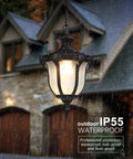 Rustic Victorian Outdoor Pendant Light E26 Waterproof Aluminum Hanging Lantern in rain by stone house