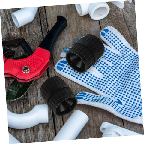Two Piece Inner Outer Reamer Deburring Tool Set For Water Pipes next to gloves and pipe cutter on wooden surface