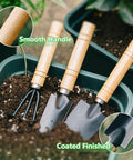 Six Piece Iron Garden Tool Set With Hand Shovels Transplant Shovel And Hand Rake, Wood Non Slip Handles in soil pots
