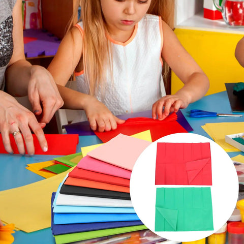 Child crafting with Ultra Thin Tissue Paper Sheets 66x50cm 40 Pack With High Light Transmission for wrapping and DIY projects.