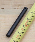 3/8 Inch By 4 Inch Drilled Survival Ferro Rod Flint Fire Starter With Toggle Lanyard Hole for camping, next to measuring tape