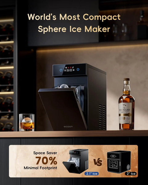 Crystal Clear Ice Ball Maker With CrystalFlux Technology for countertop use with whiskey bottle on home bar.