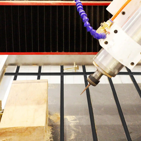 CNC machine using Pro Grade Four 48 Inch T Track System With Intersection Kit for woodworking on wooden block