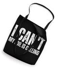 Black tote bag with text 'I Can't My Foil Is Calling' for wingfoiling enthusiasts, 16x16 inches with 14-inch handles, top view.