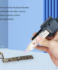Hand using Efficient Solder Paste Extruder Flux Dispenser Kit With 0.8mm And 1.3mm Nozzles for PCB soldering