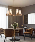 Six Light Gold Chandelier With White Frosted Glass Shades For Dining Room Living Room Kitchen And Bedroom Modern Chic Fixture For Warm Vibe And Easy Install in cozy dining room setting.