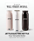 Three Jettle electric kettles in pink, white, and black colors with LED displays, as seen in Wall Street Journal, portable design.