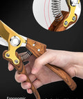 Hand holding Heavy Duty Garden Pruning Shears With Japanese SK4 High Carbon Steel Blade, wood grain handle, side view