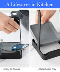 Hella Convenient Multi Function Kitchen Utensil And Pot Lid Organizer Pad With Spoon Rest Ladle Holder Catch Mat Drip Tray Washable Heavy Duty Stick Mount Black, showing detachable tray and pot lid holder.
