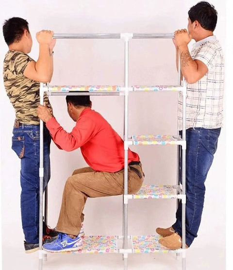 Portable Freestanding Wardrobe Built Tough With Breathable Fabric Delivers Huge Closet Storage For Clothes Shoes And Hats Hassle Free Pop Up Assembly Glides Into Any Room In Fresh Colorful Vibes with three men assembling it.
