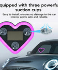 Heart Shaped Car LED Ambient Light With Solar Rechargeable Power, pink light with suction cups on car windshield.
