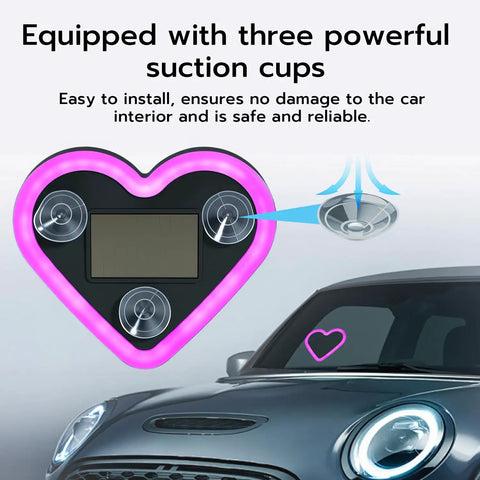 Heart Shaped Car LED Ambient Light With Solar Rechargeable Power, pink light with suction cups on car windshield.
