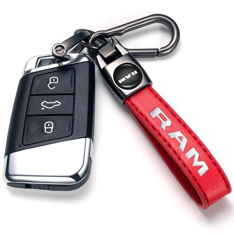 Slick Genuine Leather Car Key Chain Ring Compatible With Dodge Ram 1500 2500 3500 Featuring A Hella Sturdy Zinc Alloy Charm and a stylish red key strap.