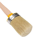 Close-up of a precision round brush with a metal ferrule and wooden handle from the Sweet Kick Ass DIY Painting Set.