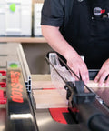Advanced T Glide Rip Fence Rock Solid Design With Dovetail Slots Compatible With Industrial Cabinet Saw in use cutting wood.
