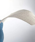 Hands holding Ultra Slim Aerogel Insulation Padding 9.8 Inch Square Pack Of 10 0.1 Inch Thick Heat Shield, showcasing flexibility.