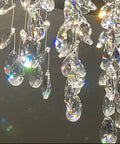 Close-up of crystal petals on 20 Inch Modern Crystal Chandelier With Dimmable LED Lighting For Living Room, Dining Room, Foyer And Bedroom, High Ceiling Pendant Light, Lit Crystal Fixture, 3000K-6000K Color Temp, Remote Dimmable