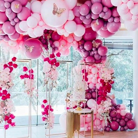 Hot Pink Balloons Party Kit 140 Pcs Includes 18 Inch 12 Inch 10 Inch 5 Inch Magenta Fuchsia Dark Pink Thick Durable Latex Balloons For Balloon Arch Garland Bridal Shower Baby Shower Birthday Party Decorations featured in a vibrant arch and garland display with floral accents.