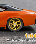Close-up of 1/64 scale orange diecast car with gold 5 spoke rims from Two Pack 1 By 64 Scale Wheels And Tires With Real Riders Rims.