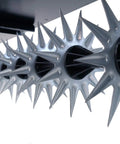 Close-up of 11 tine stars with 12 spike tips on a Tow Behind Spike Aerator With Transport Wheels, galvanized carbon steel.