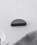 Woodruff Key KM-510A5100 12Mm X 2.9Mm X 4.8Mm, 10 Pack For Lawn Mower Engines, shown on stone surface, metal part