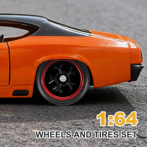 Close-up of RC car with Four Piece 1 By 64 Scale Wheel And Tire Set, black five-star rims, red line finish.