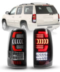 Close-up of I1MOTOR LED tail light pair for Chevy Suburban/Tahoe/Yukon, glossy black housing with clear lenses