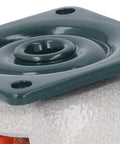 Close-up of a professional grade leveling caster with a green mounting plate for easy height adjustment.