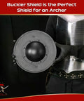 Person holding Medieval Buckler Shield 12 Inch 16 Gauge Steel Handheld Shield With Wooden Grip For LARP Reenactment Cosplay And Display