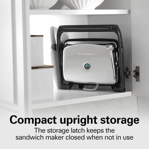 Hamilton Beach Panini Press And Sandwich Maker With Electric Indoor Grill Nonstick Plates, stored upright with latch.