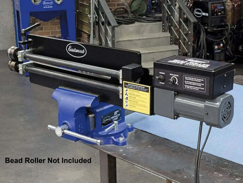 Bead Roller Drive System With 1/6 HP 120V Motor, Variable Speed 0 To 20 RPM, And Foot Pedal Control attached to a workbench