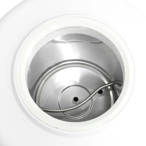 Stainless steel reservoir inside the Top Loading Water Cooler Dispenser That Fits 3 And 5 Gallon Bottles, white interior view