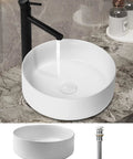 Round Bathroom Vessel Sink 14.4 Inch Above Counter Porcelain Ceramic Matte White Modern Vanity Basin Art Bowl For Contemporary Bathrooms Durable Scratch Resistant Easy To Clean Stylish Centerpiece displayed on marble surface with tap and drain.