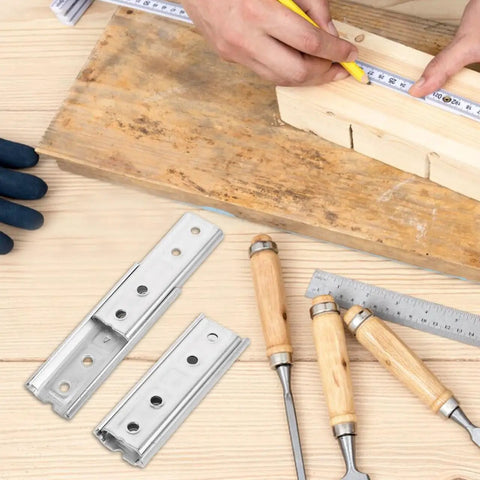 Heavy Duty Hidden Headboard Wall Mount Brackets For Sofa And Couch Sections With Solid Silver Metal Connectors on workbench.