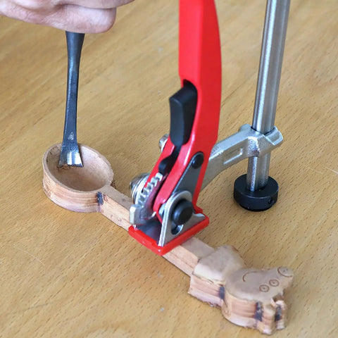 Hold Down Clamp With Quick Acting Ratchet For Woodworking Benches and Desktop Clips in use on wooden workpiece