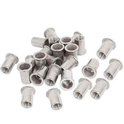 Thirty Piece 1/4 20 Unc Stainless Steel Rivet Nutserts Hella Tough Threaded Inserts for sheet metal, showing various sizes and shapes.