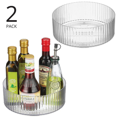 Two Pack Fluted Lazy Susan Plastic Spinner Turntable For Kitchen Counter Organizing Rotating Organizer Swivel Tray For Spices And Accessories 9 Inch Round Clear Sturdy Build, holding bottles.