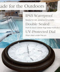 Must Have 24 Inch Indoor Outdoor Lighted Clock With Self Illuminated Face Waterproof 3 In 1 Weather Station Including Thermometer And Hygrometer Metal Clock In Oil Rubbed Bronze Finish Night Light displayed by a pool.