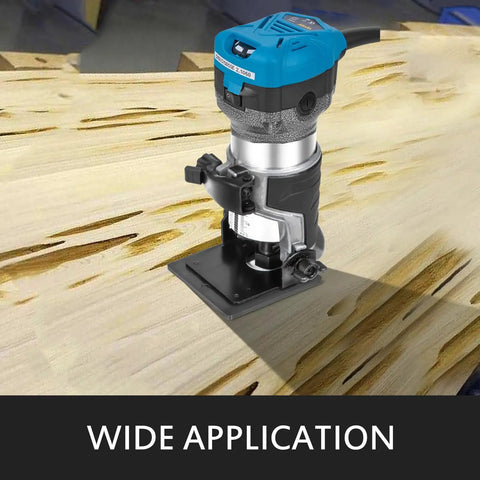 Built Like A Tank Compact Router With Fixed Plunge And Tilt Bases, 1.25 HP on wood surface for furniture crafting.