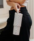 32 Oz Insulated Stainless Steel Water Bottle With Fly Polka Dot Drip And French Vanilla Finish Reusable Sport Flask in hand.