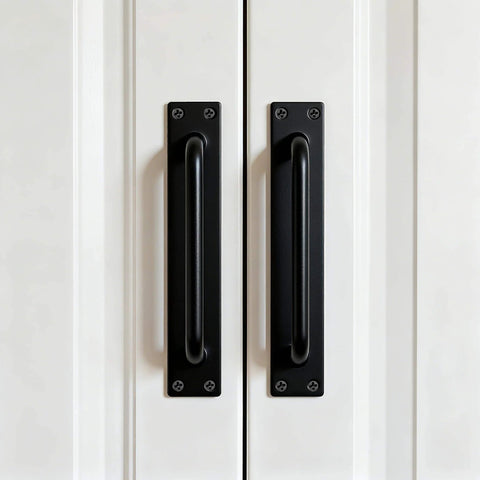 Beefy 12 Inch Heavy Duty Steel Barn Door Handles Black Powder Coat 2 Pack installed on white door