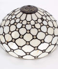 Close-up of stained glass shade from Tiffany Style Cream Amber Stained Glass Table Lamp With Bead Accents, 12-inch diameter.