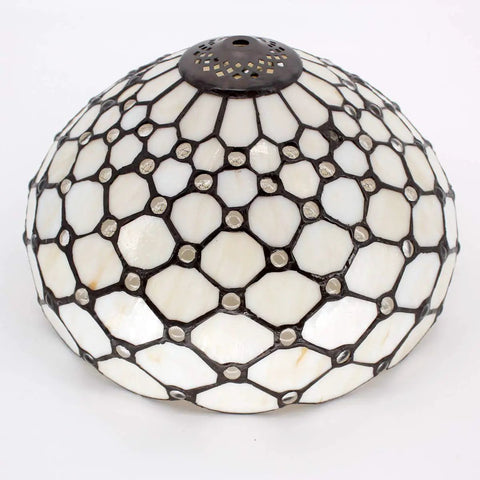 Close-up of stained glass shade from Tiffany Style Cream Amber Stained Glass Table Lamp With Bead Accents, 12-inch diameter.